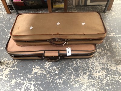 Lot 994 - Two violin cases with their outer canvas covers