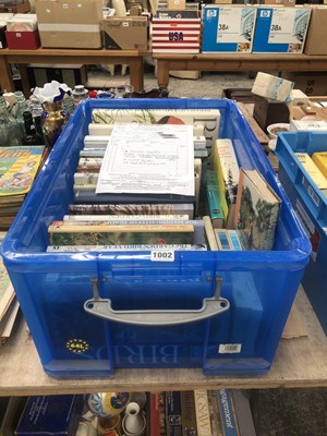 Lot 1002 - A collection of bird guides and related books