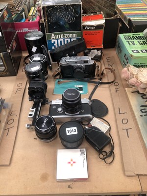 Lot 1013 - Canon and Zorki cameras, carrying cases,...
