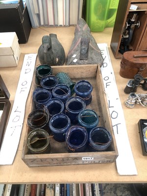 Lot 1017 - Two decoy ducks, glass nightlight holders in a...