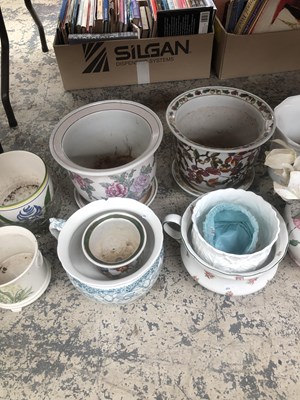 Lot 1021 - Planters, chamber pots, books and a brass...