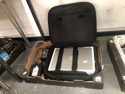 Lot 1093 - A cased Dell laptop with a CD and a microphone...