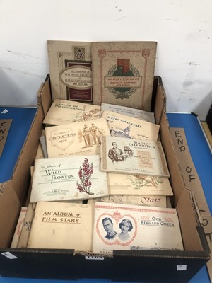 Lot 1103 - A large collection of cigarette cards in...