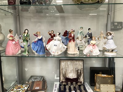 Lot 814 - Fourteen Doulton figures of ladies