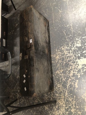 Lot 1129 - A wooden tool box containing saws, a chopper...