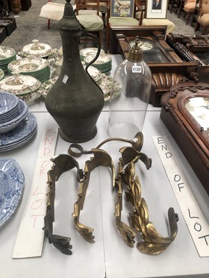 Lot 1137 - A set of four brass curtain tie back clips, a...