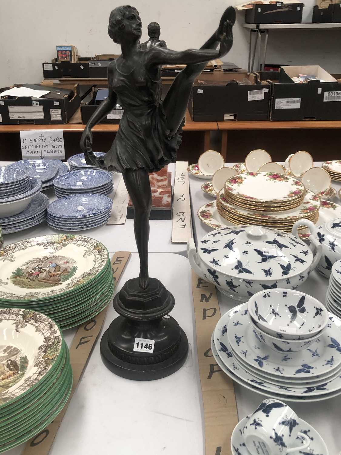 Lot 1146 - An Art Deco style bronze figure of a high...