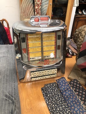 Lot 1038 - A Seeburg 200 Wall-O-Matic table top juke box...