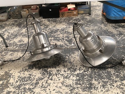 Lot 1165 - A pair of ceiling lights with aluminium shades