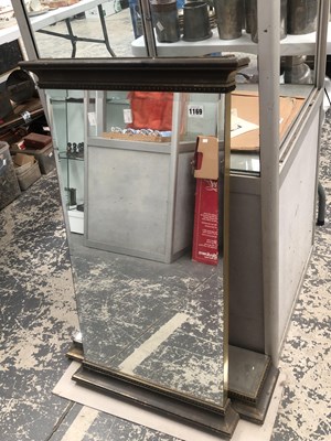 Lot 1169 - A rectangular mirror with its mirrored stand
