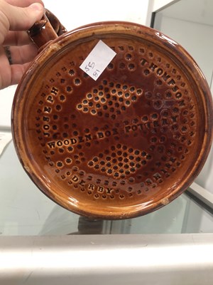 Lot 1172 - A Joseph Thompson Wooden Box treacle glazed...