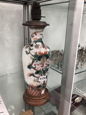 Lot 1174 - A Chinese vase decorated with grapes and...