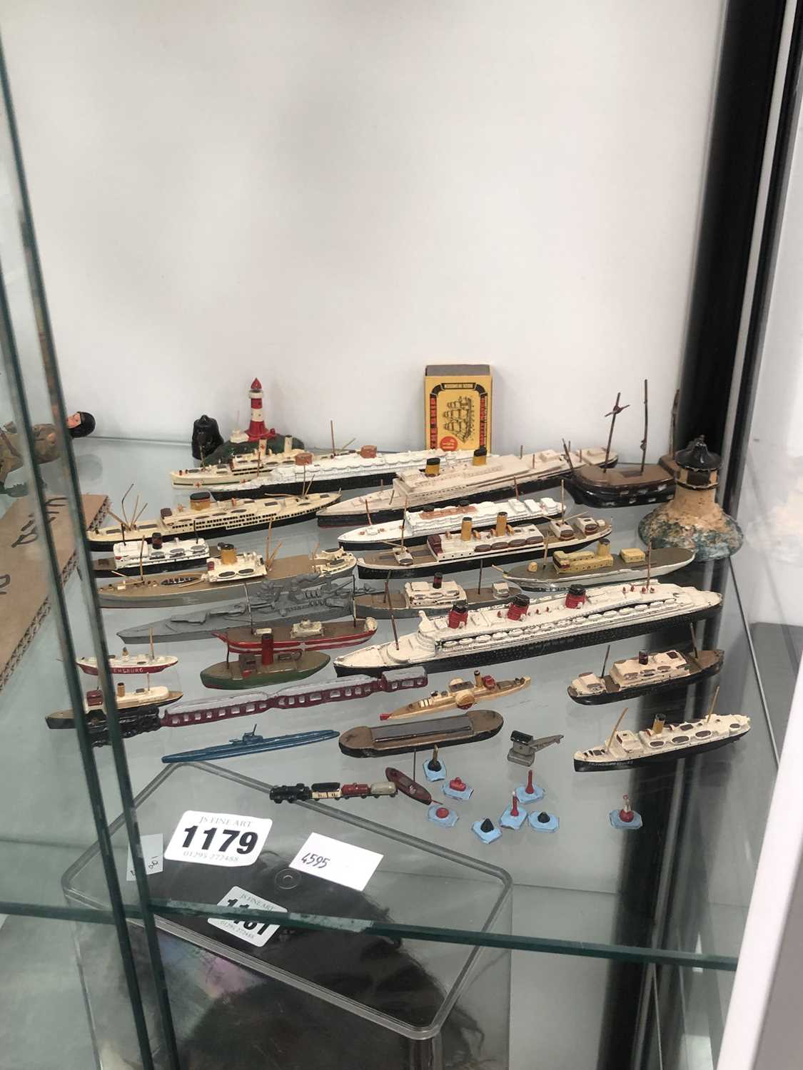 Lot 1179 - A collection of die cast model cruisers, ships,...