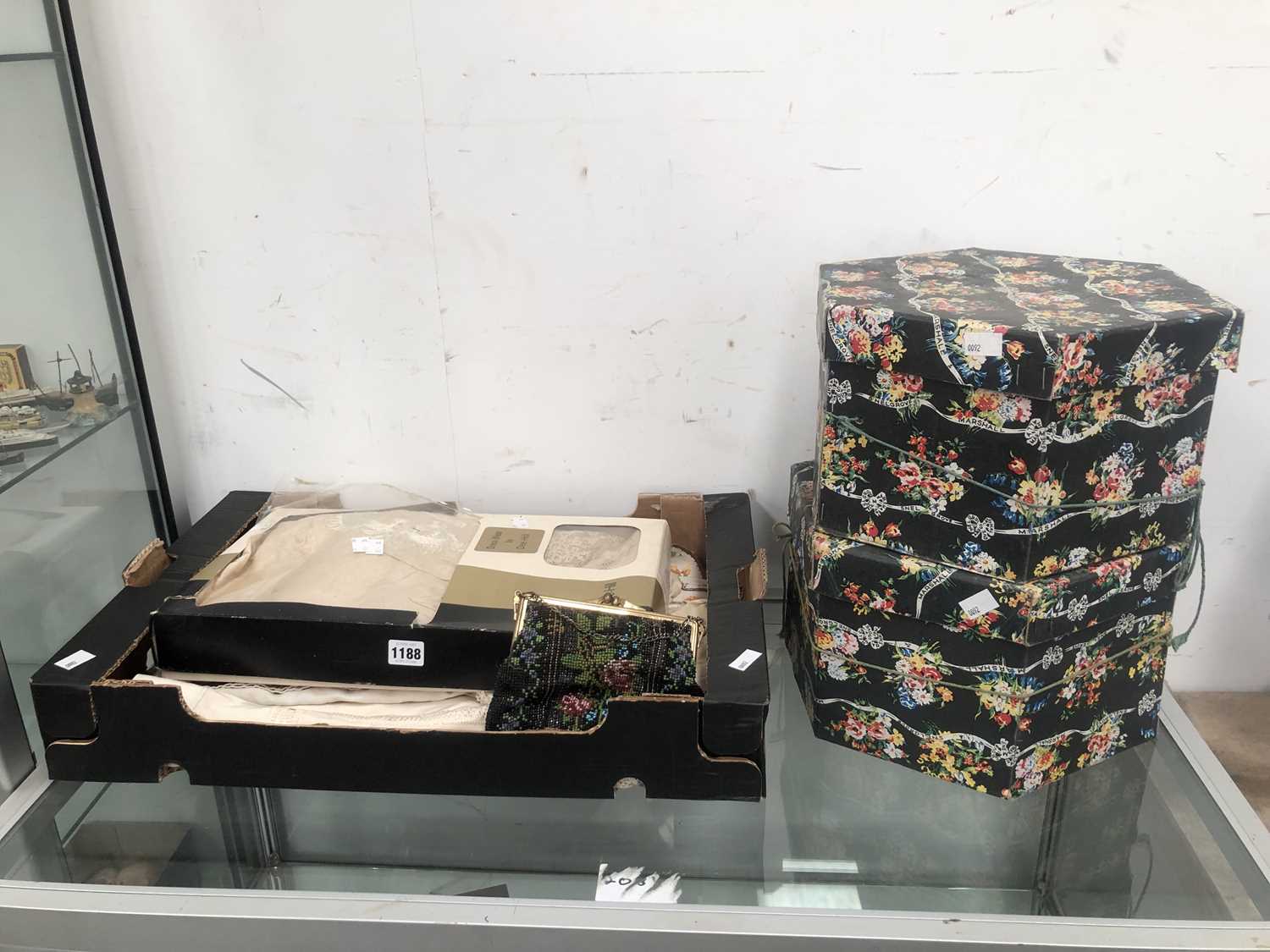 Lot 1188 - Two boxed lady's hats, a bead work bag...
