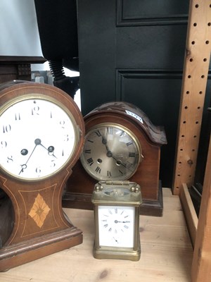 Lot 1199 - Seven mantle clocks, two clock cases, an arch...