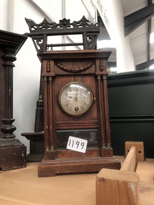 Lot 1199 - Seven mantle clocks, two clock cases, an arch...