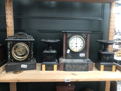 Lot 1202 - A black slate clock garniture together with a...