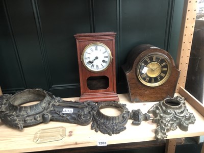 Lot 1203 - Metal aneroid barometer and clock cases...
