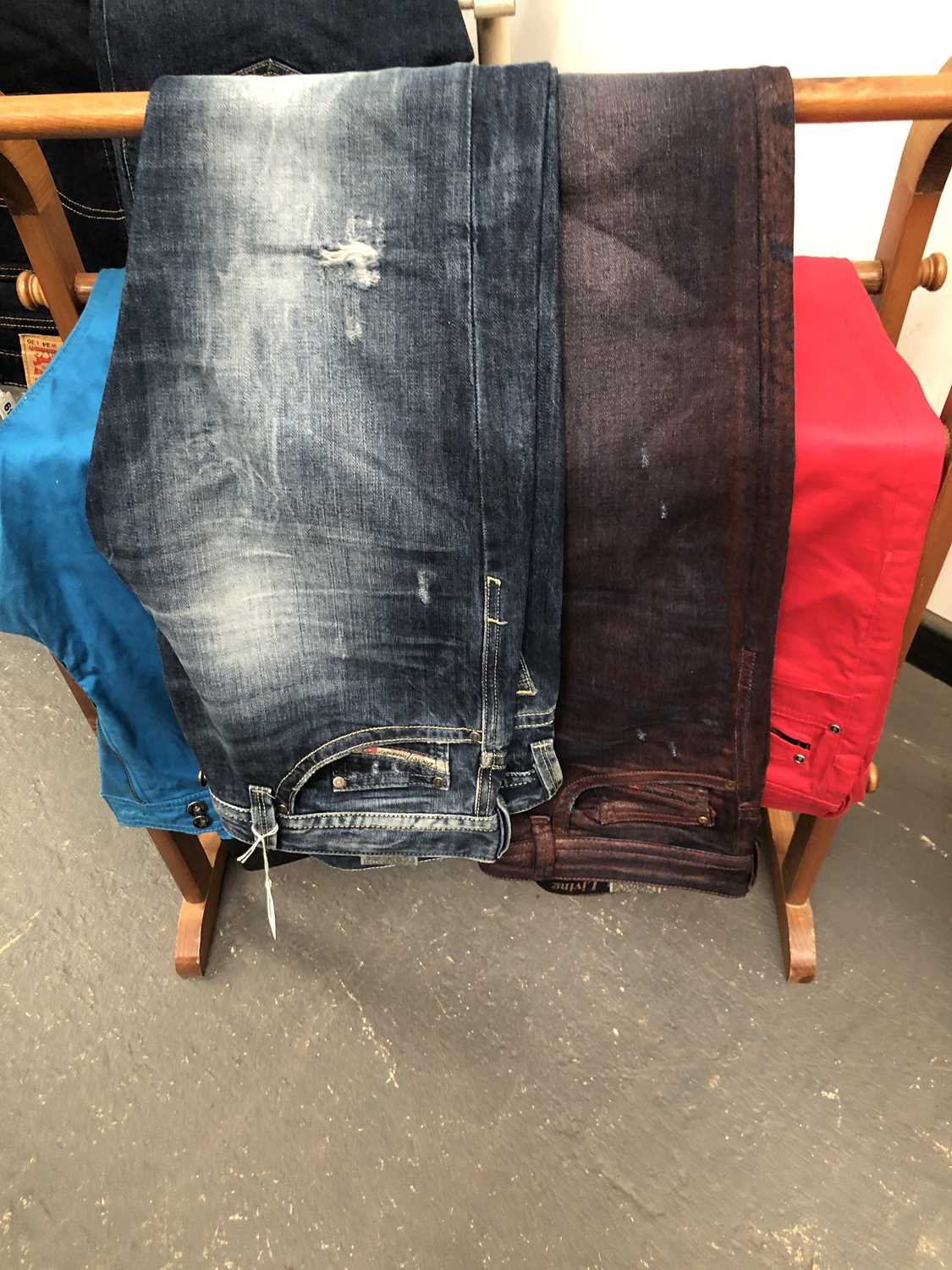 Lot 648 - Four pairs of Diesel jeans one size 31 and...