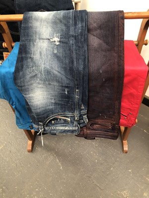 Lot 648 - Four pairs of Diesel jeans one size 31 and...