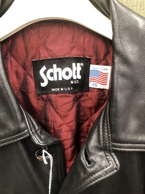 Lot 652 - A vintage MG Racing Red and Black jacket size...