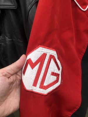Lot 652 - A vintage MG Racing Red and Black jacket size...