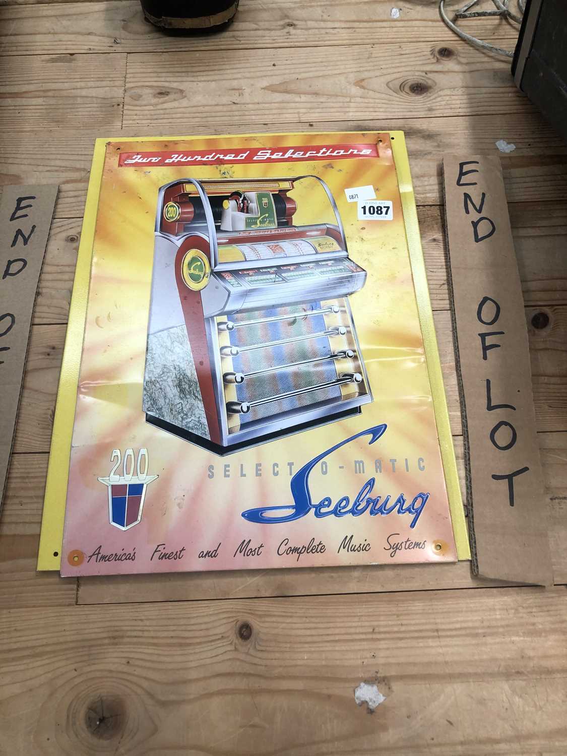 Lot 1087 - 2 tin signs; a juke box sign and a Mini sign.