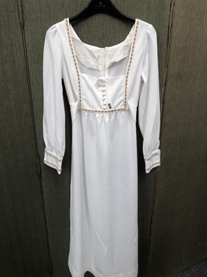 Lot 656 - Ladies clothing. A vintage ladies long sleeve...