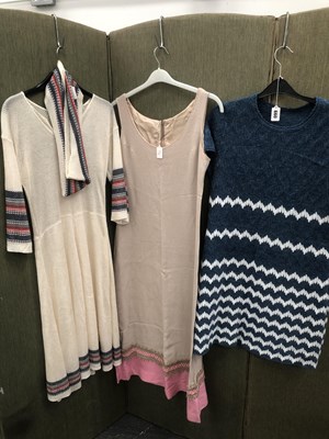 Lot 660 - Ladies clothing. A knitted blue short dress...