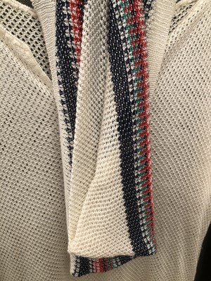 Lot 660 - Ladies clothing. A knitted blue short dress...