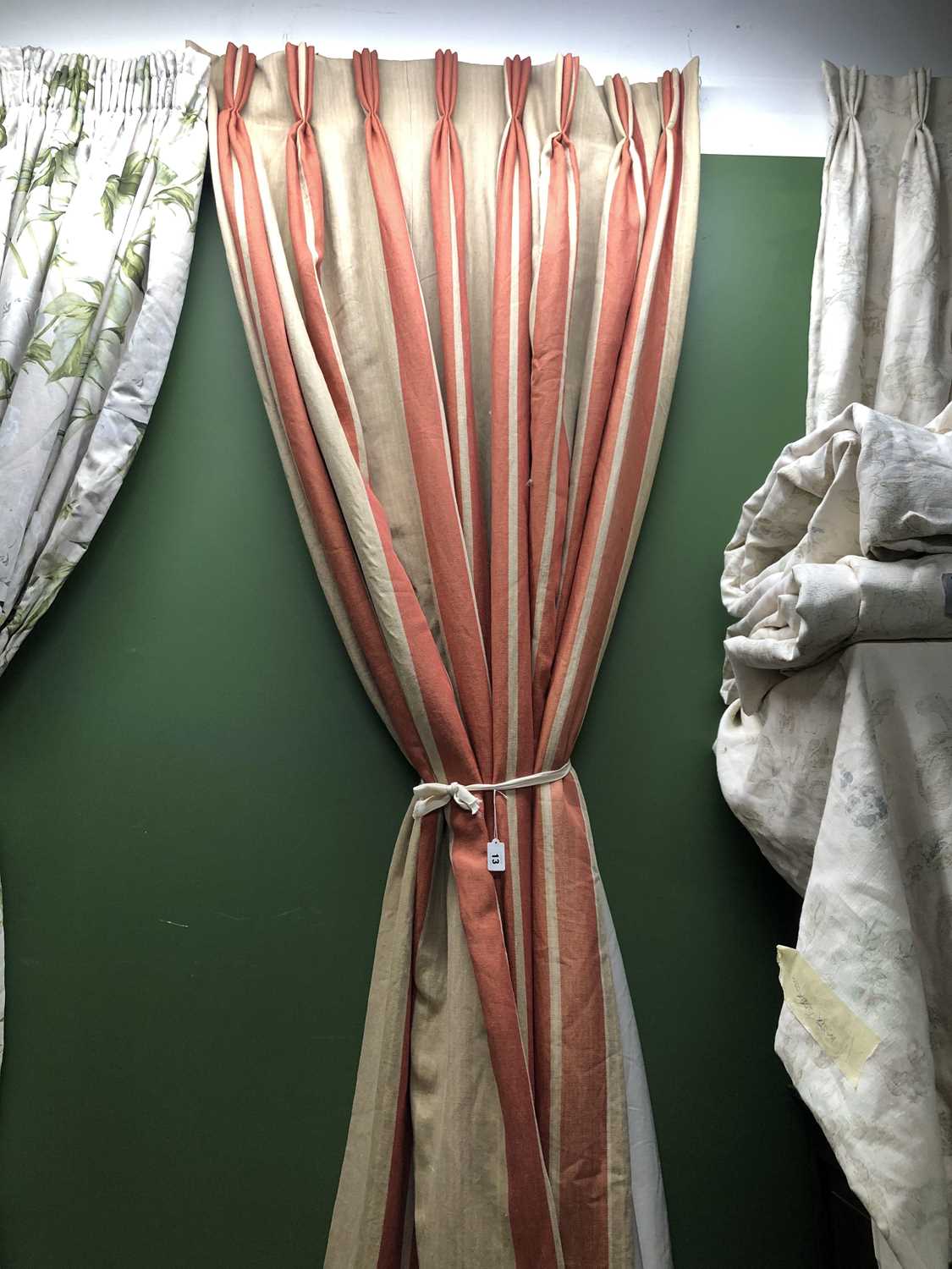 Lot 13 - A pair of orange stripe interlined curtains. ...