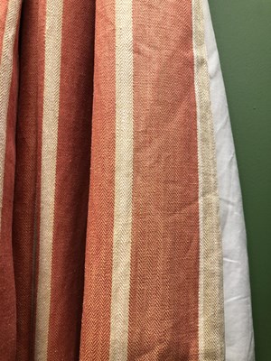 Lot 13 - A pair of orange stripe interlined curtains. ...