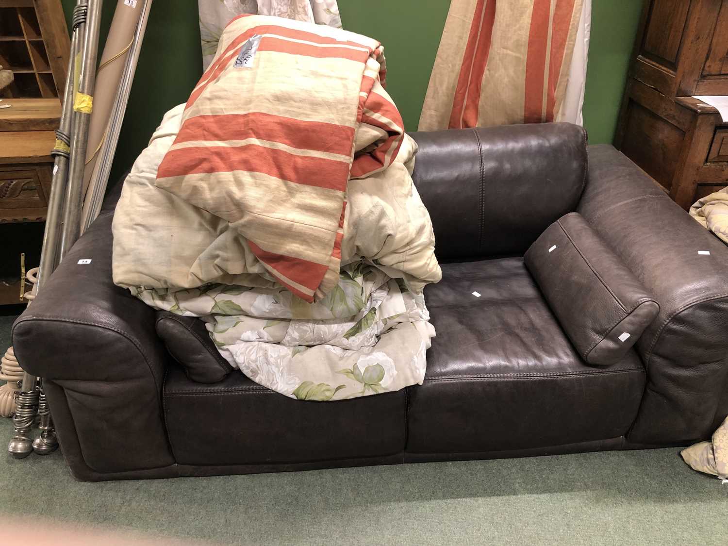 Lot 14 - A Brown leather two seat settee. W 195 x D 106...