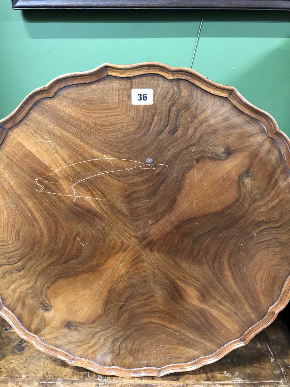 Lot 36 - A mahogany quarter veneered coffee table...