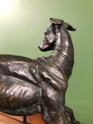Lot 39 - Style of P J Mene, a bronze whippet poised on...