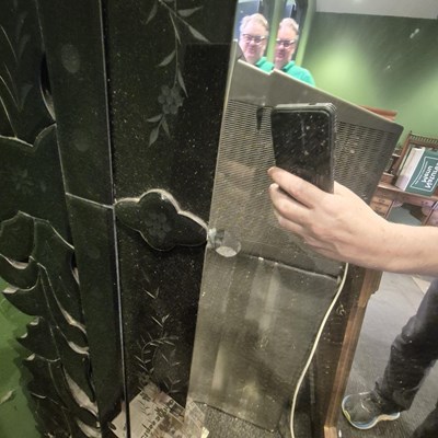 Lot 53 - A bevelled glass rectangular mirror within a...