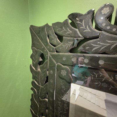 Lot 53 - A bevelled glass rectangular mirror within a...