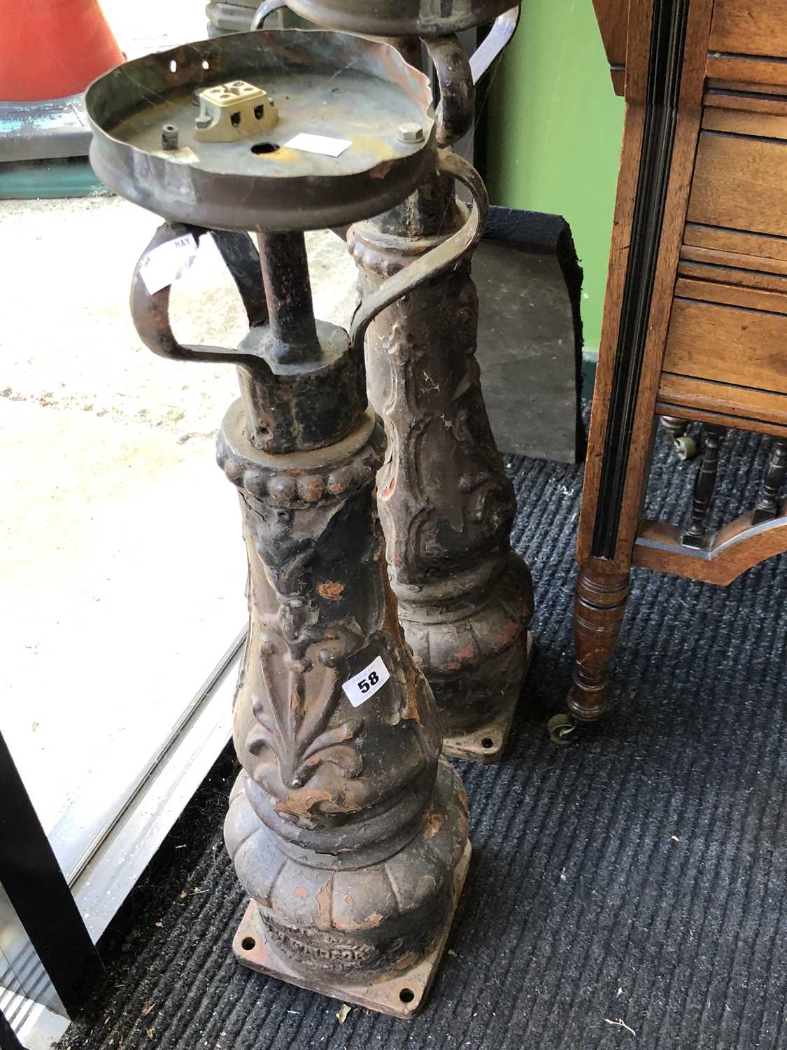 Lot 58 - A pair of baroque style metal table lamps