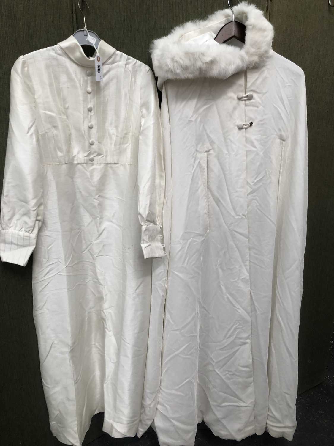Lot 686 - Ladies clothing. A vintage wedding dress and a...