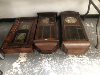 Lot 1212 - Three wall clocks in glazed mahogany cases to...