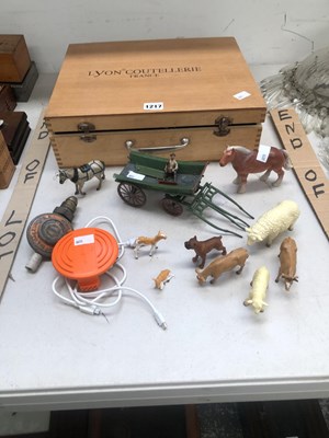 Lot 1217 - A cased table clamping corkscrew, toy farm...