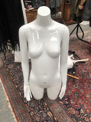 Lot 1225 - A white plastic three quarter length female...