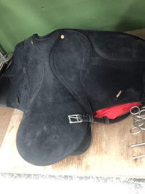 Lot 1232 - A Wintec saddle, horse blankets, various bits...