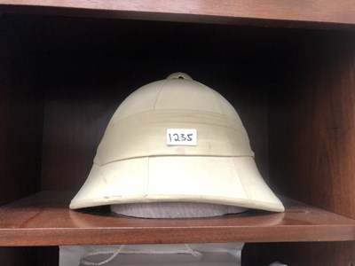 Lot 1235 - A pith helmet