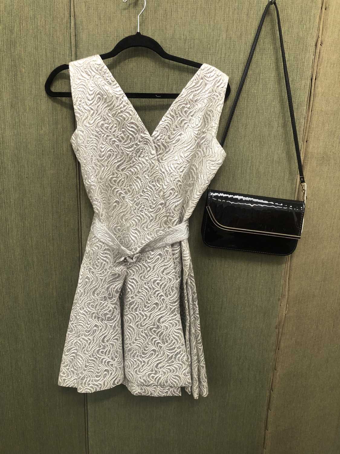 Lot 696 - Ladies clothing. Vintage silver metallic...