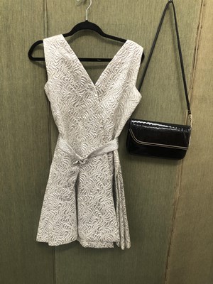 Lot 696 - Ladies clothing. Vintage silver metallic...