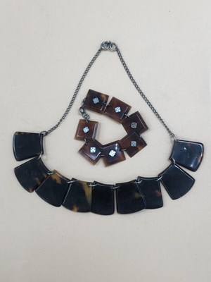 Lot 523 - An Art Deco tortoise shell panel necklace and...