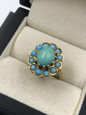 Lot 526 - A vintage turquoise cluster ring. Unhallmarked,...