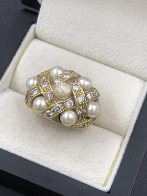 Lot 534 - A large cocktail basket-type ring, set with a...
