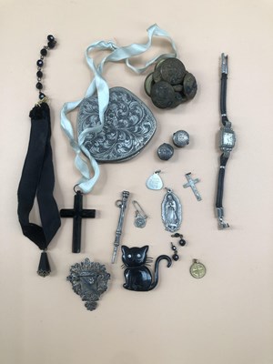 Lot 539 - A vintage black cross pendant, an 800...